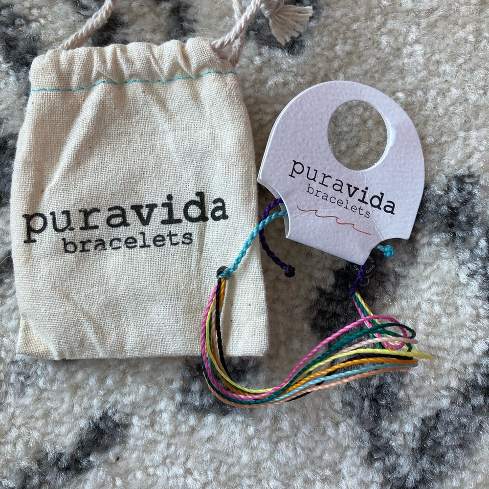 Pura vida string bracelet NWT in dust bag bullying awareness blue, green, pink